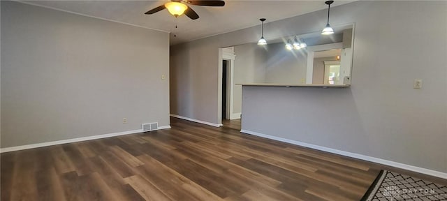 289 Dayton Ave, Xenia, OH 45385 - empty room featuring a ceiling fan and dark wood finished floors