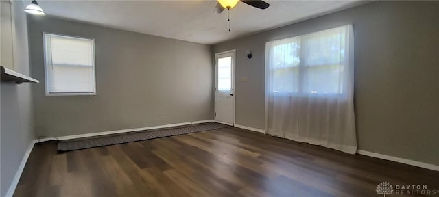289 Dayton Ave, Xenia, OH 45385 - empty room featuring dark wood-style floors and ceiling fan