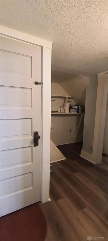 289 Dayton Ave, Xenia, OH 45385 - hallway with a textured ceiling and wood finished floors