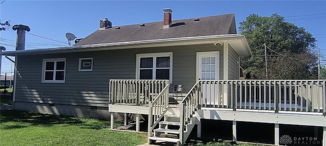 289 Dayton Ave, Xenia, OH 45385 - rear view of property featuring a lawn, a wooden deck, and a chimney