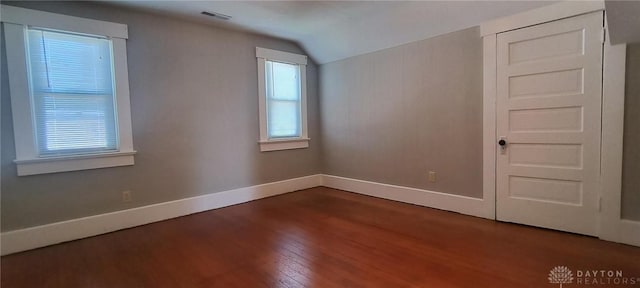 289 Dayton Ave, Xenia, OH 45385 - unfurnished room with vaulted ceiling and wood finished floors