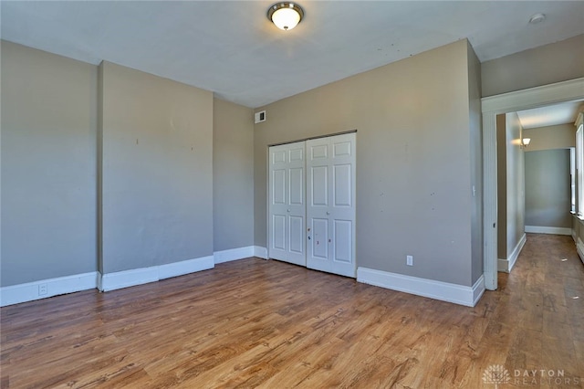 15 Bertus St, Cincinnati, OH 45217 - unfurnished bedroom with a closet and wood finished floors