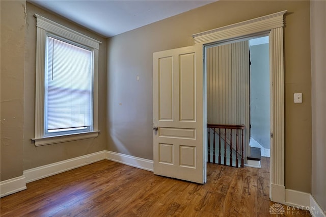 15 Bertus St, Cincinnati, OH 45217 - spare room with wood finished floors and plenty of natural light