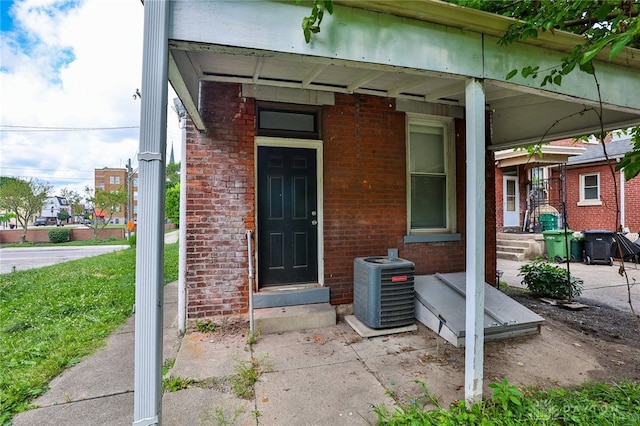 15 Bertus St, Cincinnati, OH 45217 - doorway to property featuring brick siding