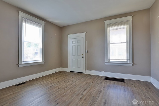 15 Bertus St, Cincinnati, OH 45217 - foyer entrance with plenty of natural light and wood finished floors