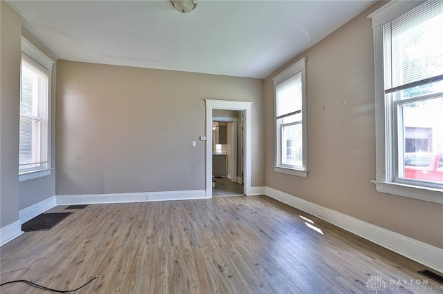15 Bertus St, Cincinnati, OH 45217 - unfurnished room with wood finished floors and baseboards