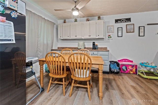 1227 Fyffe Ave, New Carlisle, OH 45344 - dining space with wood finished floors and a ceiling fan