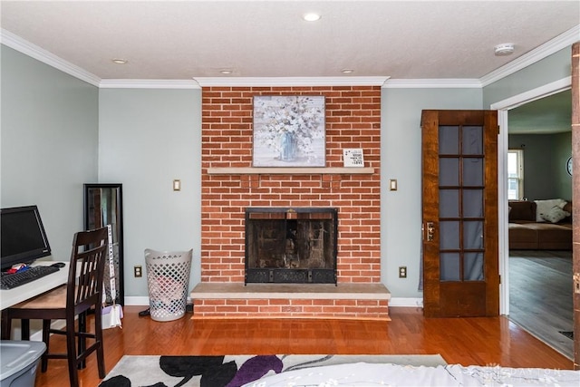 1221 Highview Dr, Fairborn, OH 45324 - living area featuring wood finished floors, crown molding, a brick fireplace, and recessed lighting