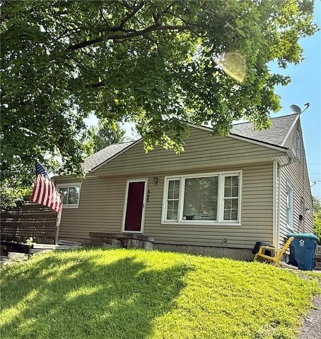 300 S Hayden Ave, Dayton, OH 45431 - bungalow-style home with a front yard and roof with shingles