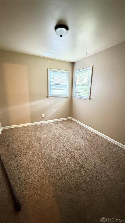300 S Hayden Ave, Dayton, OH 45431 - spare room with baseboards and carpet flooring