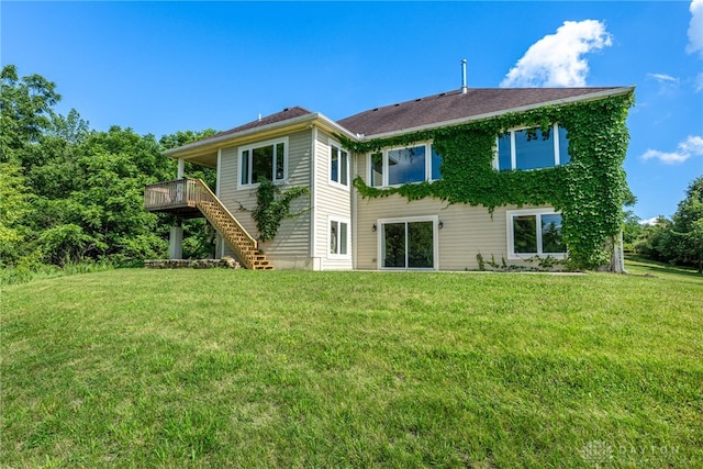 1590 Fairground Rd, Xenia, OH 45385 - rear view of house with stairway, a yard, and a wooden deck