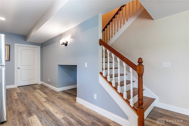 1590 Fairground Rd, Xenia, OH 45385 - stairway featuring wood finished floors