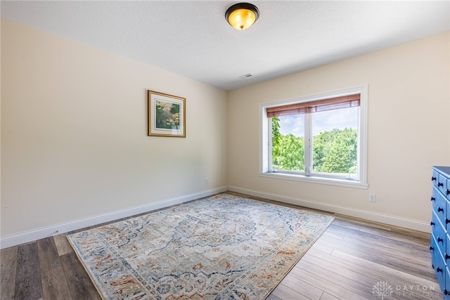 1590 Fairground Rd, Xenia, OH 45385 - spare room featuring baseboards and wood finished floors