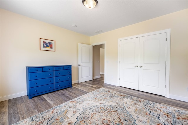 1590 Fairground Rd, Xenia, OH 45385 - bedroom with wood finished floors and a closet