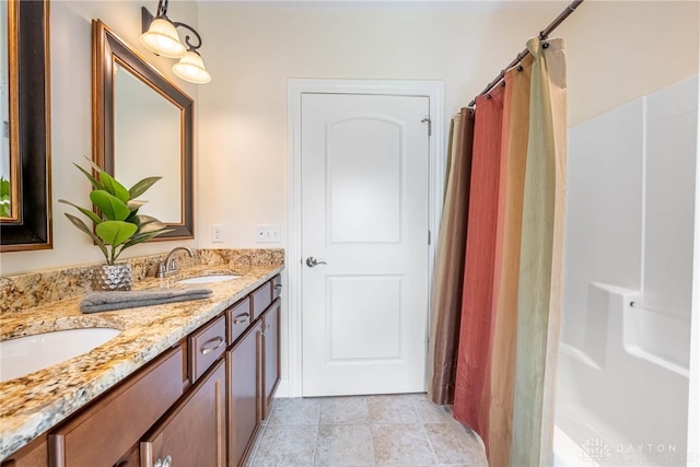 1590 Fairground Rd, Xenia, OH 45385 - bathroom featuring double vanity and a shower with shower curtain