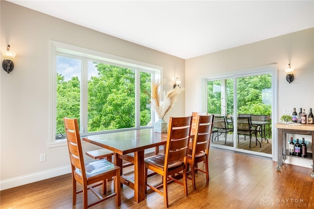 1590 Fairground Rd, Xenia, OH 45385 - dining room featuring healthy amount of natural light and wood finished floors