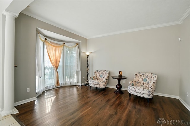 2435 Forest Oaks Dr, Beavercreek, OH 45431 - living area with decorative columns, crown molding, and wood finished floors
