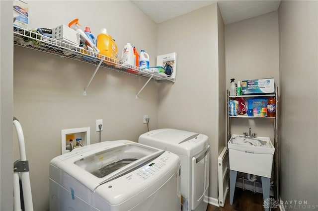 2435 Forest Oaks Dr, Beavercreek, OH 45431 - laundry room with washer and dryer and dark wood-type flooring