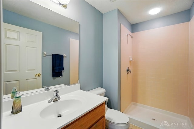 2435 Forest Oaks Dr, Beavercreek, OH 45431 - bathroom featuring tiled shower and vanity