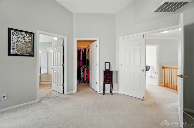 2435 Forest Oaks Dr, Beavercreek, OH 45431 - unfurnished bedroom with a spacious closet, carpet floors, a closet, and connected bathroom