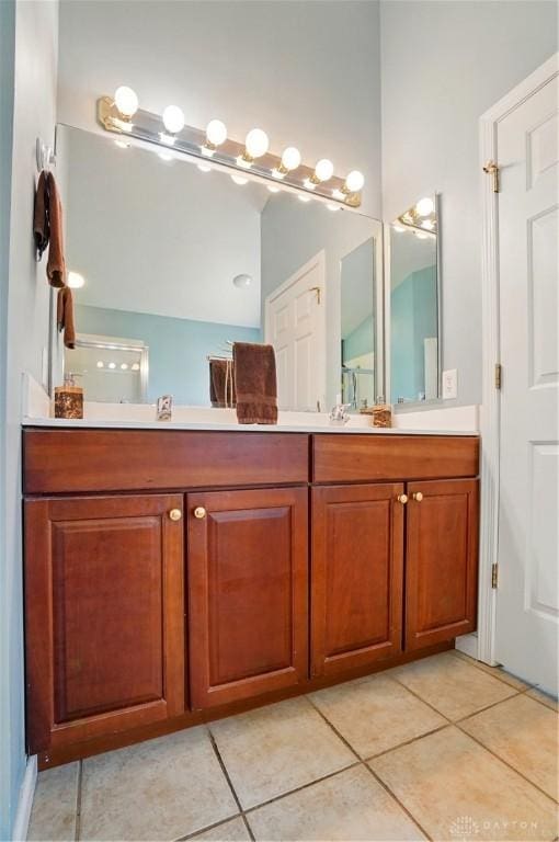 2435 Forest Oaks Dr, Beavercreek, OH 45431 - full bath featuring double vanity and tile patterned flooring
