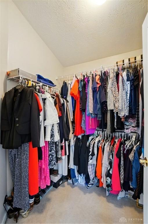 2435 Forest Oaks Dr, Beavercreek, OH 45431 - walk in closet featuring carpet