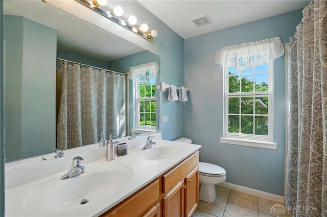 2435 Forest Oaks Dr, Beavercreek, OH 45431 - bathroom featuring double vanity and tile patterned floors