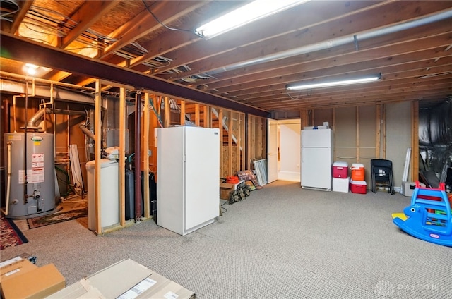 2435 Forest Oaks Dr, Beavercreek, OH 45431 - unfinished below grade area featuring freestanding refrigerator, water heater, a water softener, and carpet floors