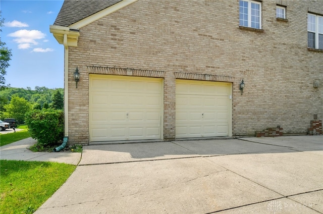 2435 Forest Oaks Dr, Beavercreek, OH 45431 - garage featuring concrete driveway