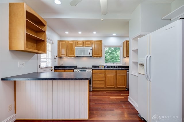 25 Laura Ave, Dayton, OH 45405 - kitchen featuring white appliances, open shelves, dark countertops, a peninsula, and dark wood-style floors