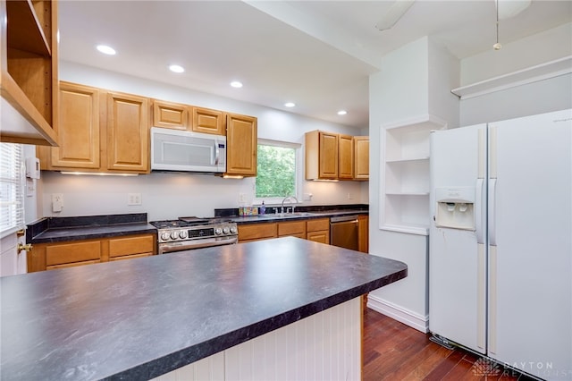 25 Laura Ave, Dayton, OH 45405 - kitchen with stainless steel appliances, dark countertops, dark wood-style floors, and recessed lighting