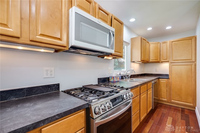 25 Laura Ave, Dayton, OH 45405 - kitchen with appliances with stainless steel finishes, dark wood-type flooring, dark countertops, and recessed lighting