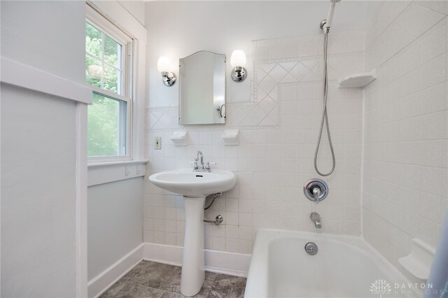 25 Laura Ave, Dayton, OH 45405 - bathroom featuring healthy amount of natural light, shower / washtub combination, and tile walls
