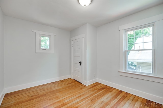 25 Laura Ave, Dayton, OH 45405 - unfurnished room with healthy amount of natural light and light wood-style floors