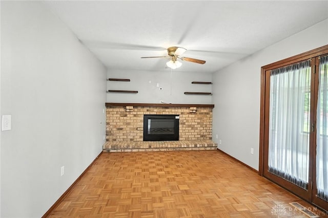 5 Bayberry Dr, Springboro, OH 45066 - unfurnished living room featuring a ceiling fan and a fireplace