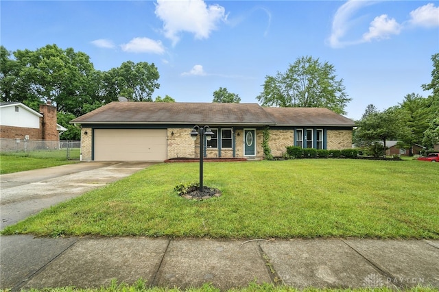 5 Bayberry Dr, Springboro, OH 45066 - single story home with a garage, driveway, and brick siding