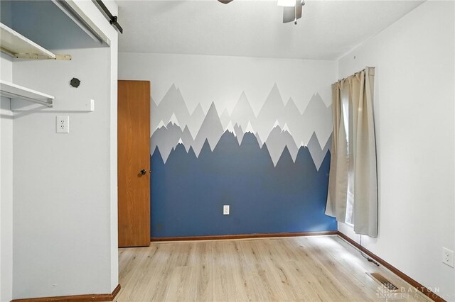5 Bayberry Dr, Springboro, OH 45066 - unfurnished room featuring a ceiling fan and wood finished floors