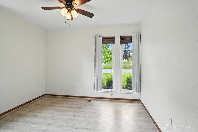 5 Bayberry Dr, Springboro, OH 45066 - empty room featuring healthy amount of natural light, light wood finished floors, and ceiling fan