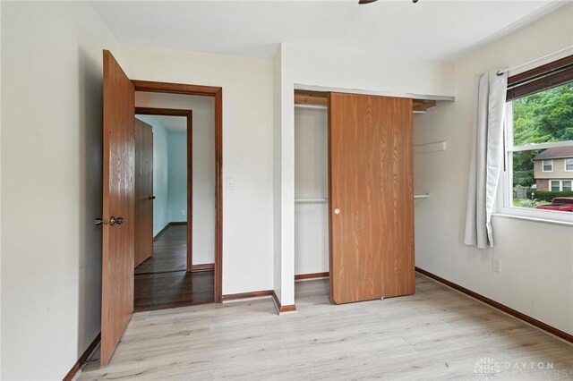 5 Bayberry Dr, Springboro, OH 45066 - unfurnished bedroom with light wood-style floors and a closet