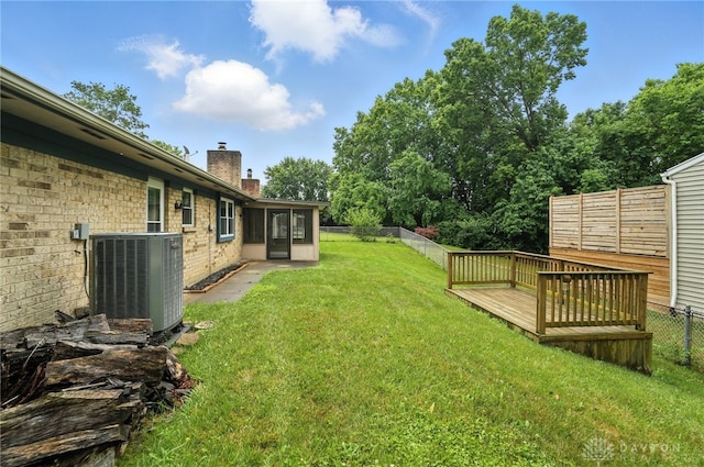 5 Bayberry Dr, Springboro, OH 45066 - fenced backyard featuring a deck and a sunroom