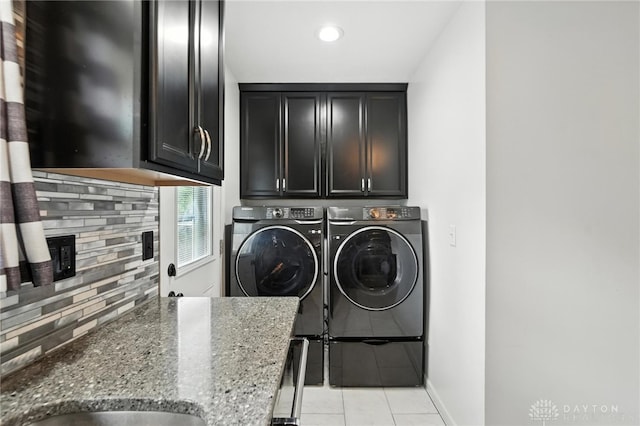 5 Bayberry Dr, Springboro, OH 45066 - washroom featuring washing machine and clothes dryer, cabinet space, light tile patterned floors, and recessed lighting
