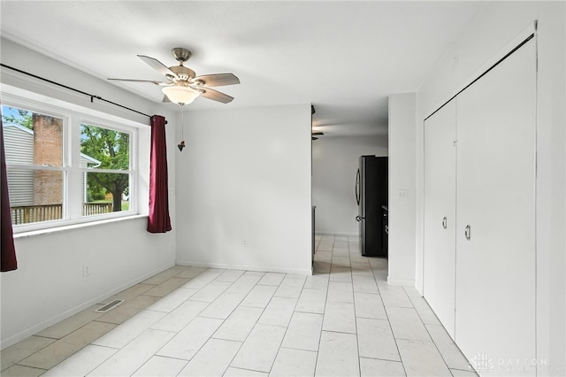 5 Bayberry Dr, Springboro, OH 45066 - empty room featuring ceiling fan and baseboards