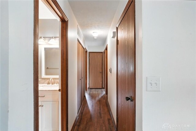 5 Bayberry Dr, Springboro, OH 45066 - hall featuring dark wood finished floors and baseboards