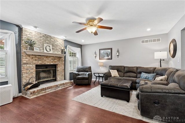 395 Victoria Pl, Waynesville, OH 45068 - living area featuring ceiling fan, a fireplace, dark wood-style floors, and recessed lighting