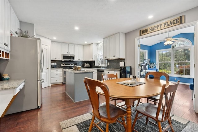 395 Victoria Pl, Waynesville, OH 45068 - dining area with dark wood-style floors, plenty of natural light, a ceiling fan, and recessed lighting