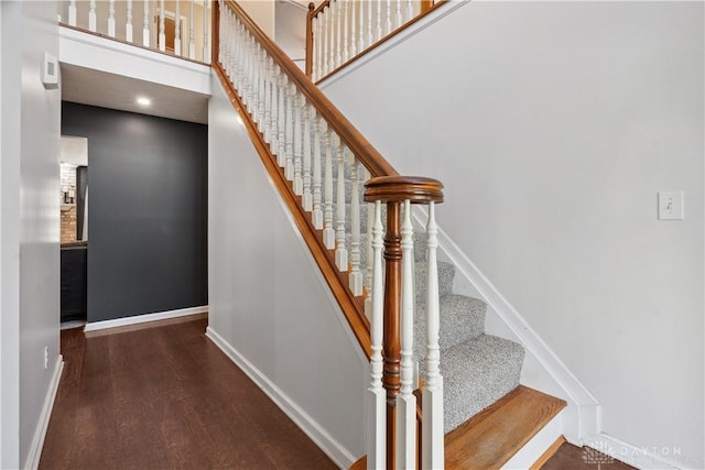 395 Victoria Pl, Waynesville, OH 45068 - stairs with wood finished floors and a towering ceiling