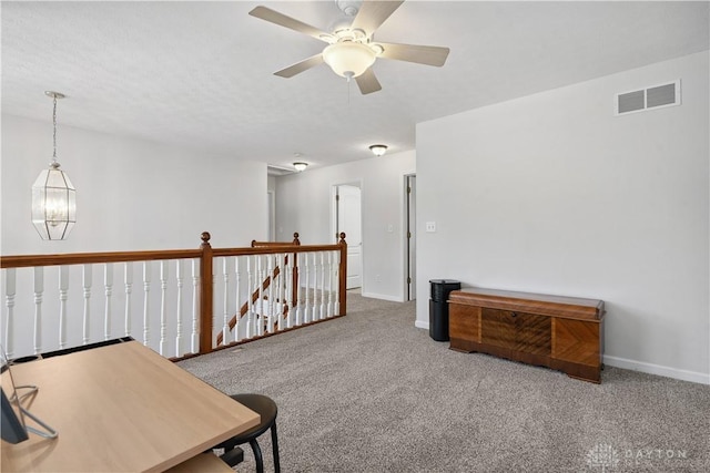 395 Victoria Pl, Waynesville, OH 45068 - sitting room featuring an upstairs landing, carpet, and a ceiling fan