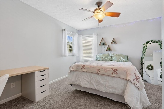 395 Victoria Pl, Waynesville, OH 45068 - carpeted bedroom featuring baseboards and a ceiling fan