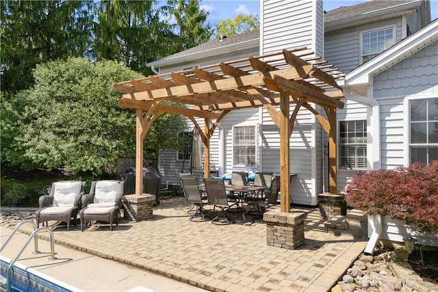 395 Victoria Pl, Waynesville, OH 45068 - view of patio with a pergola and outdoor dining space