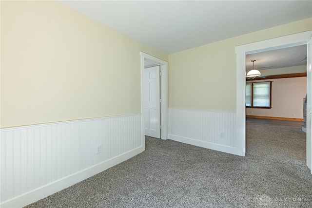 989 Ogden Rd, Adams Twp, OH 45177 - carpeted spare room with wainscoting
